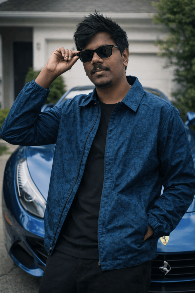 Boy with Blue Jacket and Car